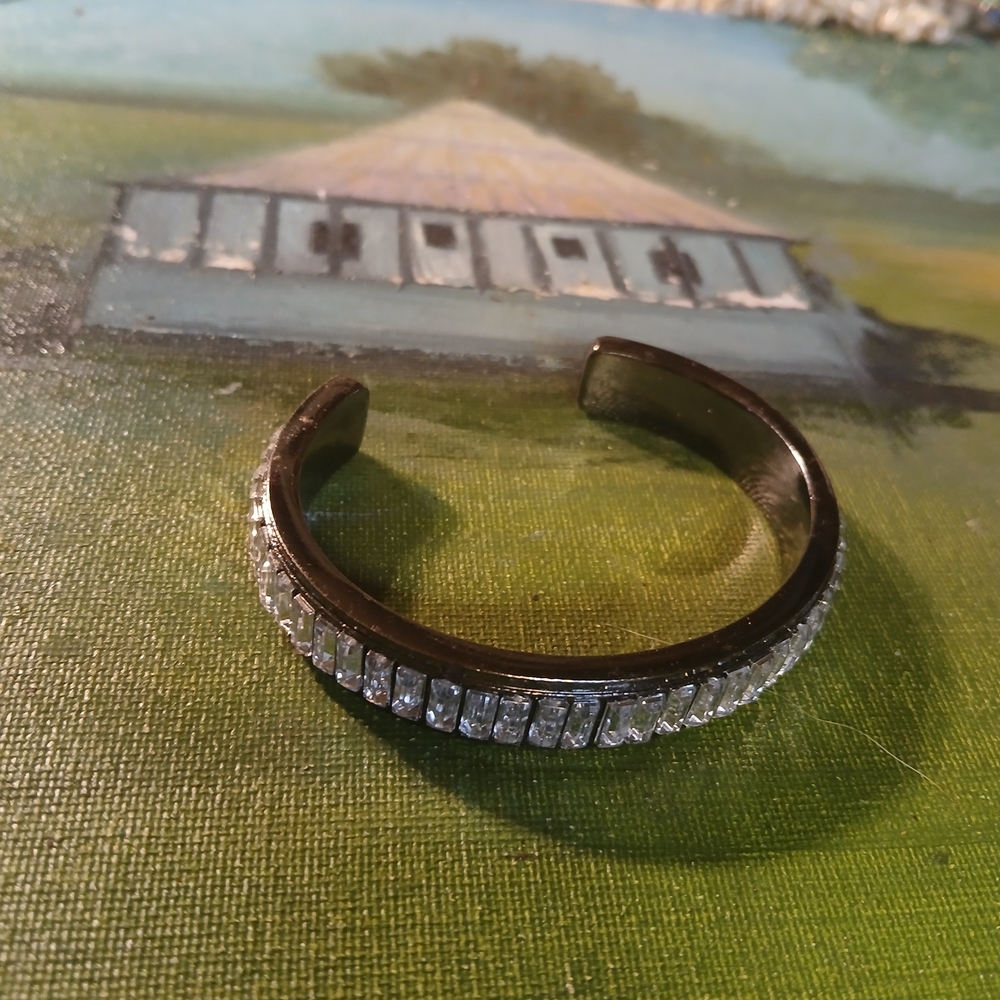 Mark. (or Lia Sophia) gunmetal-tone cuff bracelet enhanced with clear baguette-c